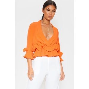 Orange Flutter Sleeve Wrap Blouse
Never worn